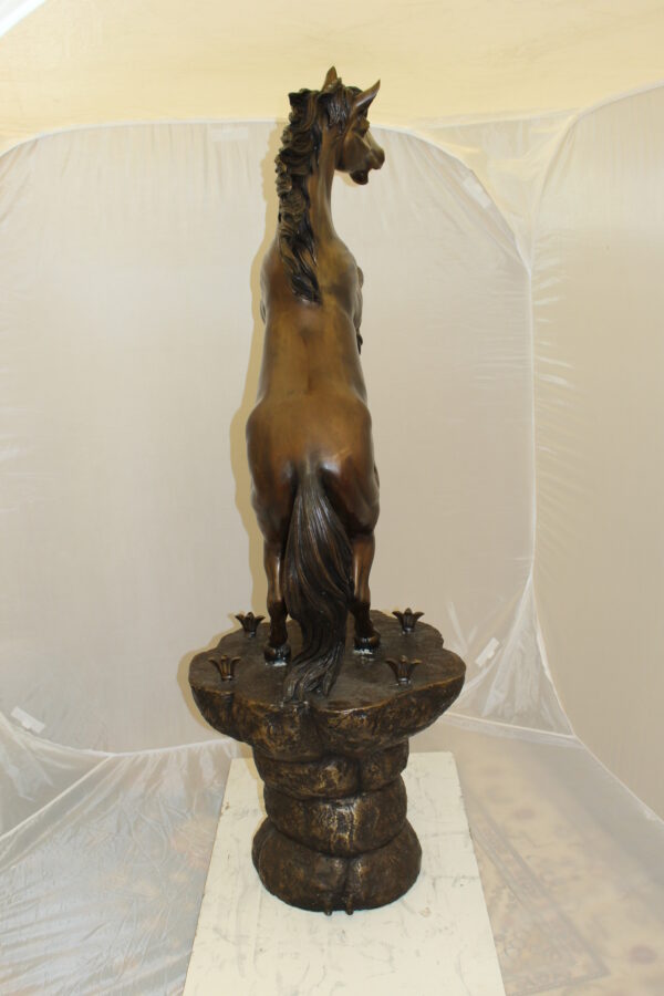 Horse on a Rock Fountain Bronze Statue -  Size: 20"L x 18"W x 56"H.