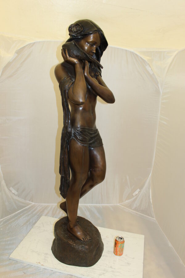 Girl Holding a Sea Shell Bronze Statue -  Size: 13"L x 14"W x 57"H.
