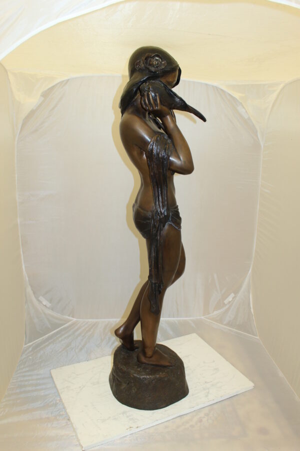 Girl Holding a Sea Shell Bronze Statue -  Size: 13"L x 14"W x 57"H.