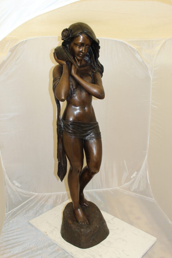 Girl Holding a Sea Shell Bronze Statue -  Size: 13"L x 14"W x 57"H.