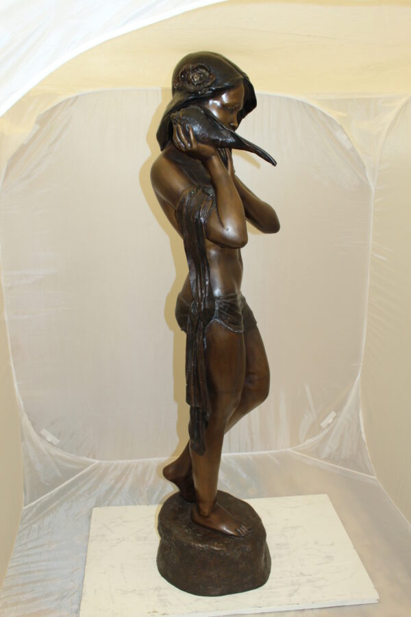 Girl Holding a Sea Shell Bronze Statue -  Size: 13"L x 14"W x 57"H.