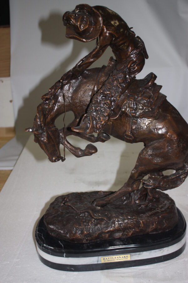 Rattlesnake by Remington Bronze Statue -  Size: 17"L x 10"W x 25"H.