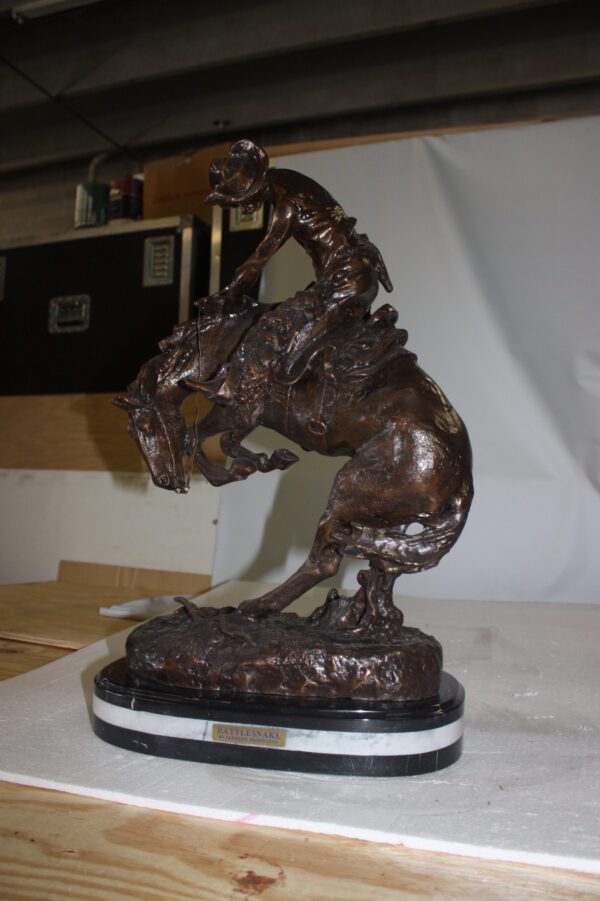 Rattlesnake by Remington Bronze Statue -  Size: 17"L x 10"W x 25"H.