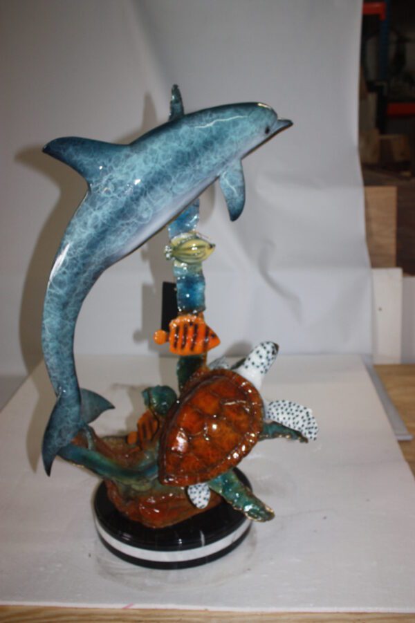 Dolphin with two fish and one turtle Statue -  Size: 22"L x 12"W x 32"H.