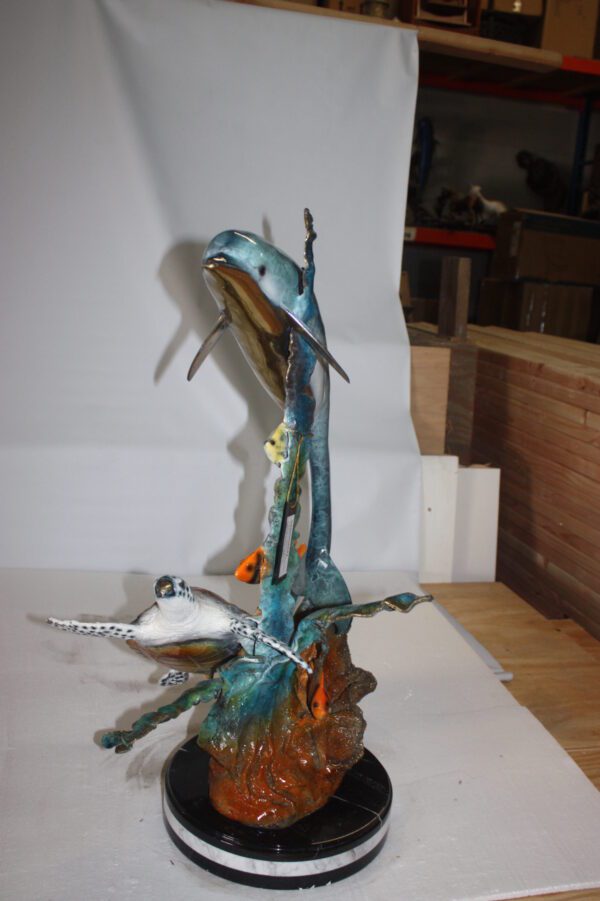 Dolphin with two fish and one turtle Statue -  Size: 22"L x 12"W x 32"H.