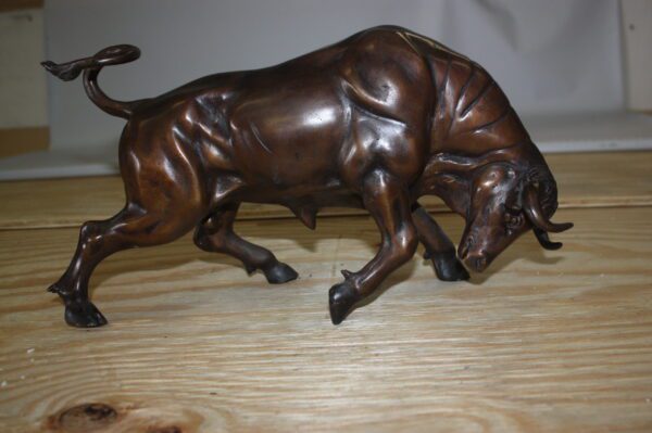 Wall street bull - small, Bronze Statue -  Size: 15"L x 4"W x 10"H.