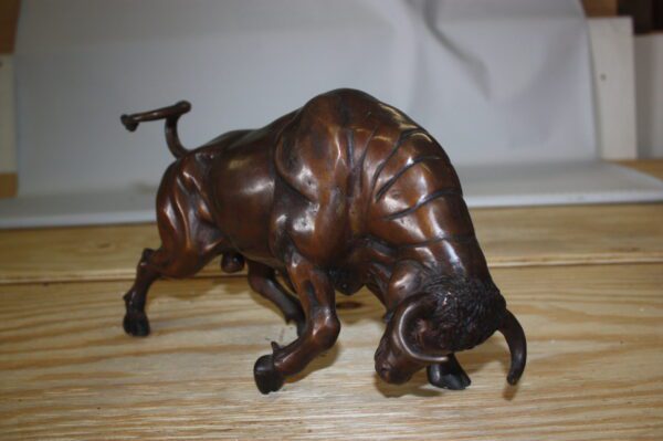 Wall street bull - small, Bronze Statue -  Size: 15"L x 4"W x 10"H.