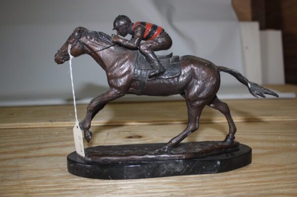 Jockey on horse - Bronze Statue -  Size: 11"L x 4"W x 8"H.