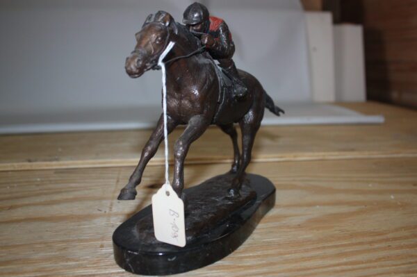 Jockey on horse - Bronze Statue -  Size: 11"L x 4"W x 8"H.