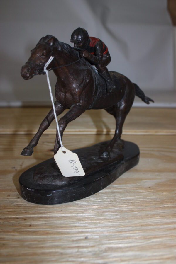 Jockey on horse - Bronze Statue -  Size: 11"L x 4"W x 8"H.