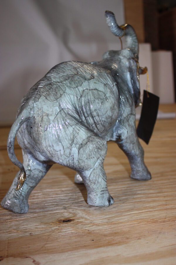 Elephant with trunk up -  Statue -  Size: 13.5"L x 5"W x 12"H.