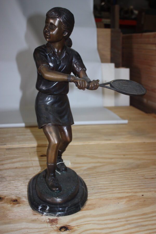 Girl Playing Tennis - Bronze Statue -  Size: 10"L x 11"W x 21"H.