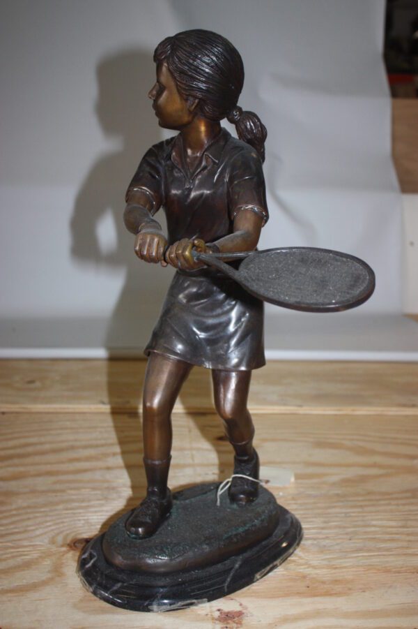 Girl Playing Tennis - Bronze Statue -  Size: 10"L x 11"W x 21"H.