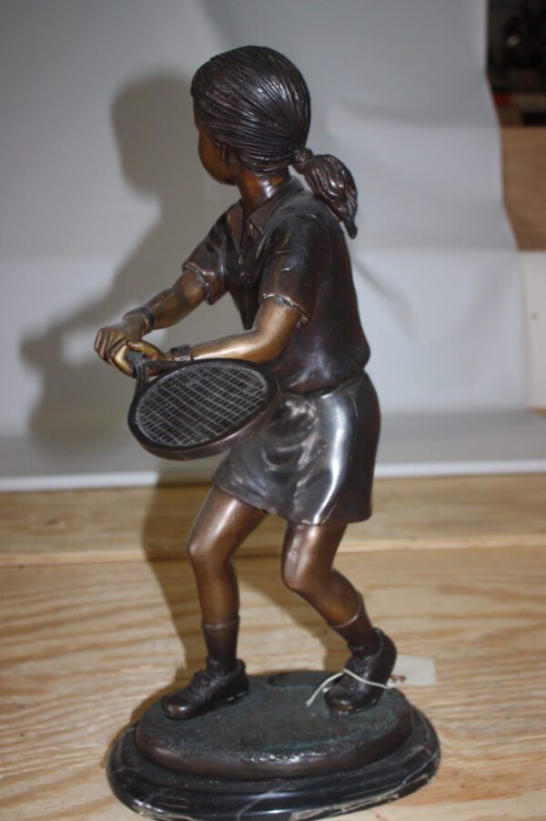 Girl Playing Tennis - Bronze Statue -  Size: 10"L x 11"W x 21"H.