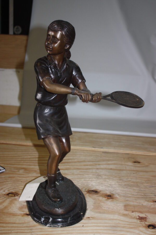 Girl Playing Tennis - Bronze Statue -  Size: 10"L x 11"W x 21"H.