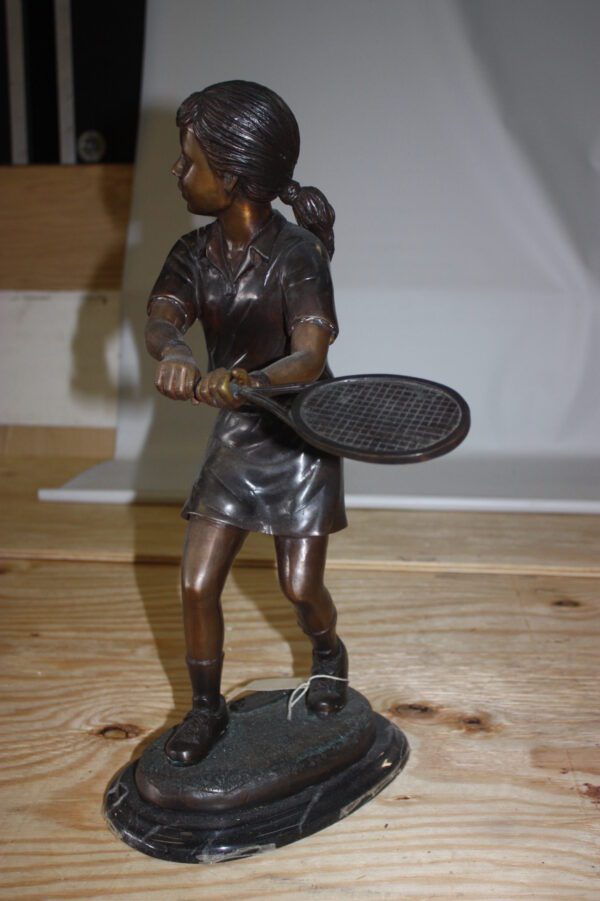 Girl Playing Tennis - Bronze Statue -  Size: 10"L x 11"W x 21"H.