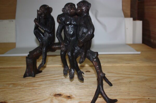 Three monkeys on a tree log - Bronze Statue -  Size: 27"L x 11"W x 18"H.