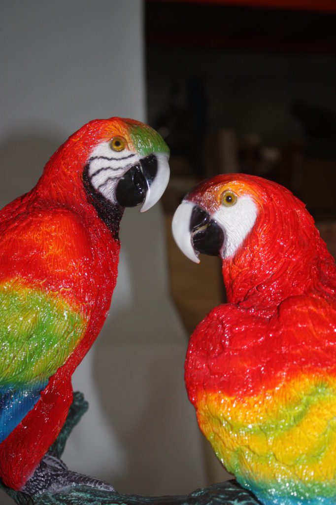 parrot statues garden