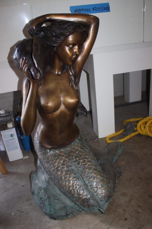 Mermaid Holding a Shell Bronze statue/fountain -  Size: 26"L x 18"W x 36"H.