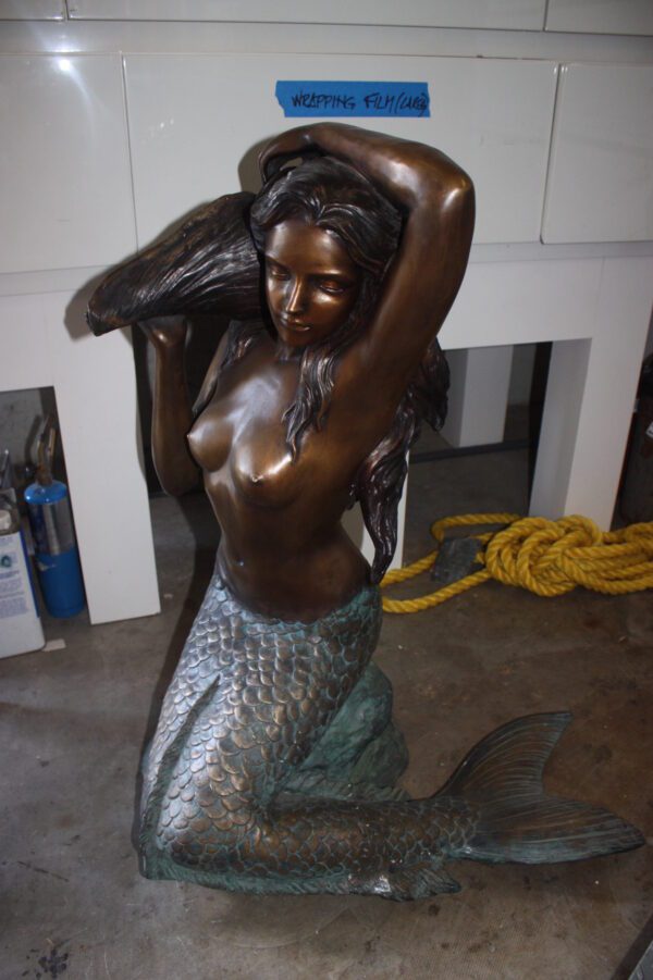 Mermaid Holding a Shell Bronze statue/fountain -  Size: 26"L x 18"W x 36"H.