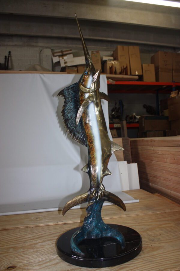 One sailfish on a marble - Bronze Statue -  Size: 17"L x 17"W x 46"H.