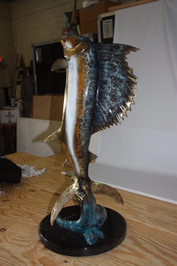 One sailfish on a marble - Bronze Statue -  Size: 17"L x 17"W x 46"H.