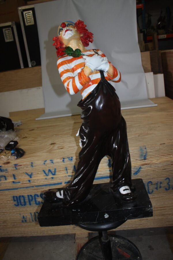 Standing clown with flowers - Bronze Statue -  Size: 21"L x 10.5"W x 38"H.