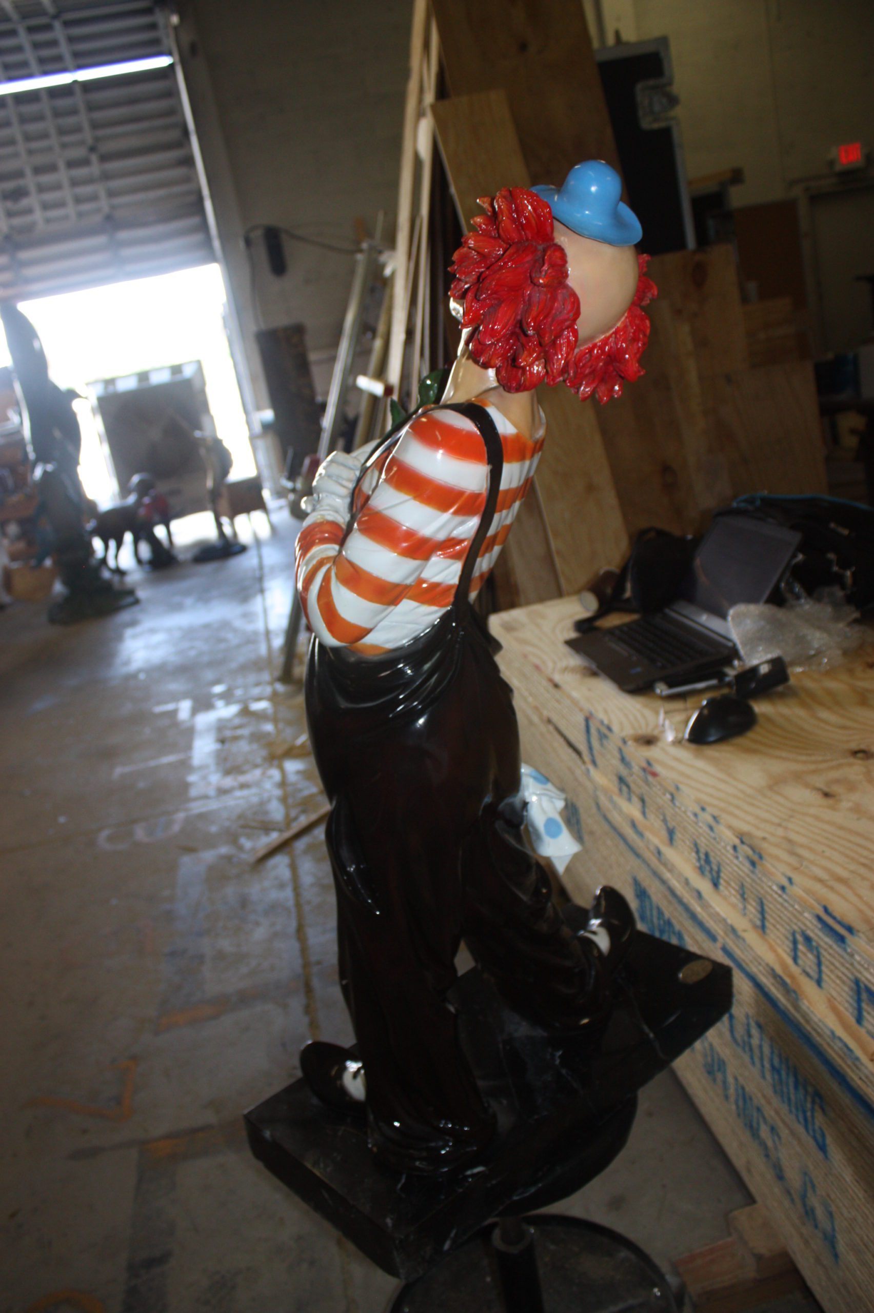 Bronze Standing Clown With Flowers Statue