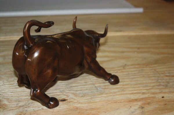 Wall street bull small - Bronze Statue -  Size: 12"L x 6"W x 7.5"H.