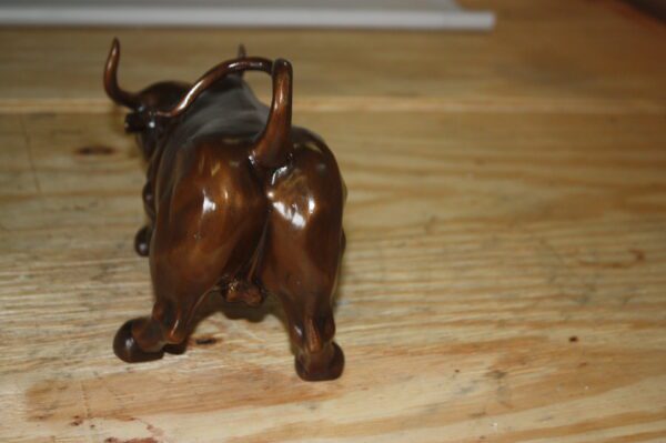 Wall street bull small - Bronze Statue -  Size: 12"L x 6"W x 7.5"H.