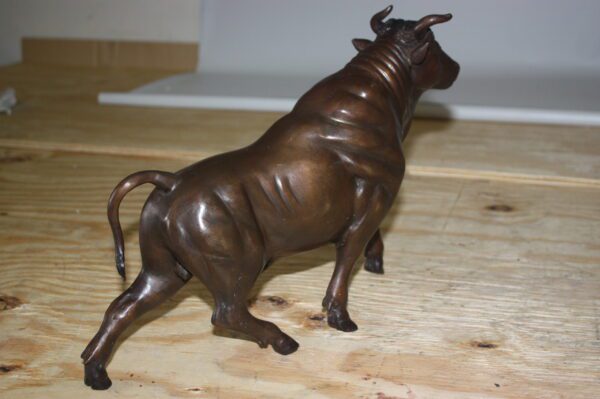 Bull Head up - Bronze Statue -  Size: 15"L x 4"W x 10"H.