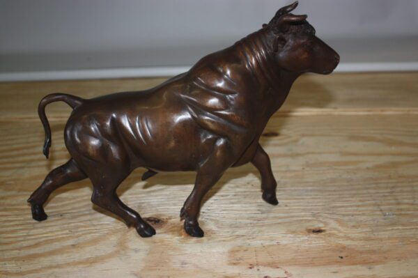 Bull Head up - Bronze Statue -  Size: 15"L x 4"W x 10"H.