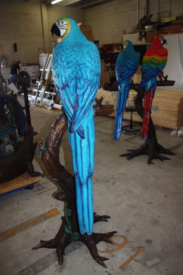 Single Parrot on a tree - Bronze Statue -  Size: 30"L x 24"W x 66"H.