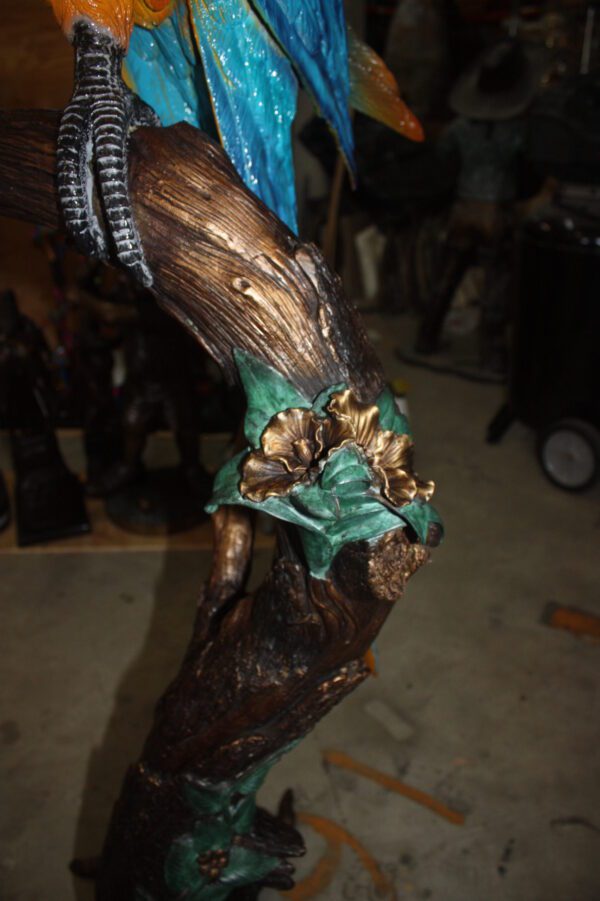 Single Parrot on a tree - Bronze Statue -  Size: 30"L x 24"W x 66"H.