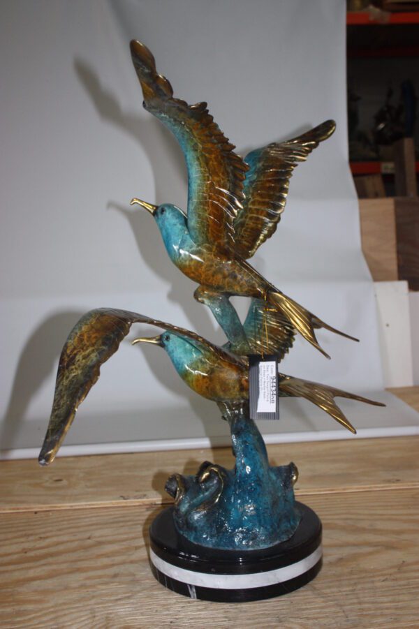 Two Seagull flying  - Bronze Statue -  Size: 36"L x 17"W x 27"H.