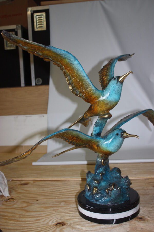 Two Seagull flying  - Bronze Statue -  Size: 36"L x 17"W x 27"H.