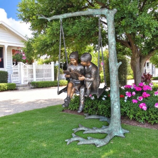 Kids on Swing Set Reading a Book Life Size Bronze Statue -  50"L x 40"W x 70"H. - Image 2