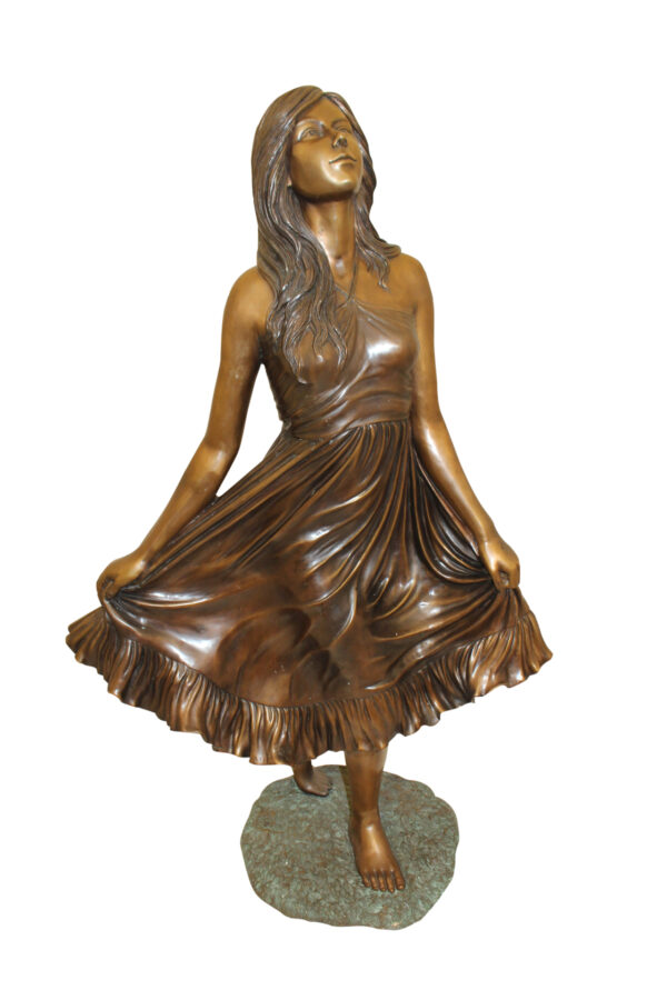 Lady holding her Skirt Bronze Statue -  Size: 32"L x 17"W x 53"H.