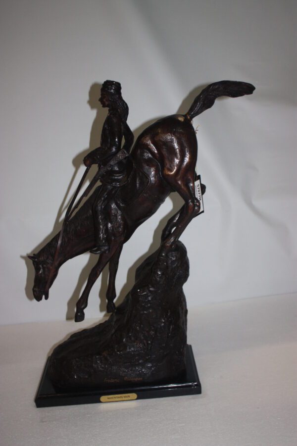 Mountain man Bronze by Fredrick Remington -  Size: 20"L x 8"W x 27"H.