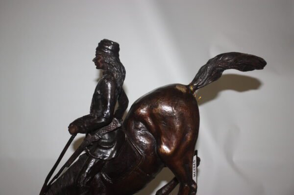 Mountain man Bronze by Fredrick Remington -  Size: 20"L x 8"W x 27"H.