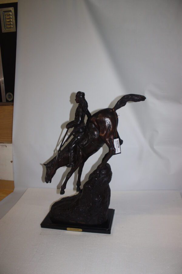 Mountain man Bronze by Fredrick Remington -  Size: 20"L x 8"W x 27"H.