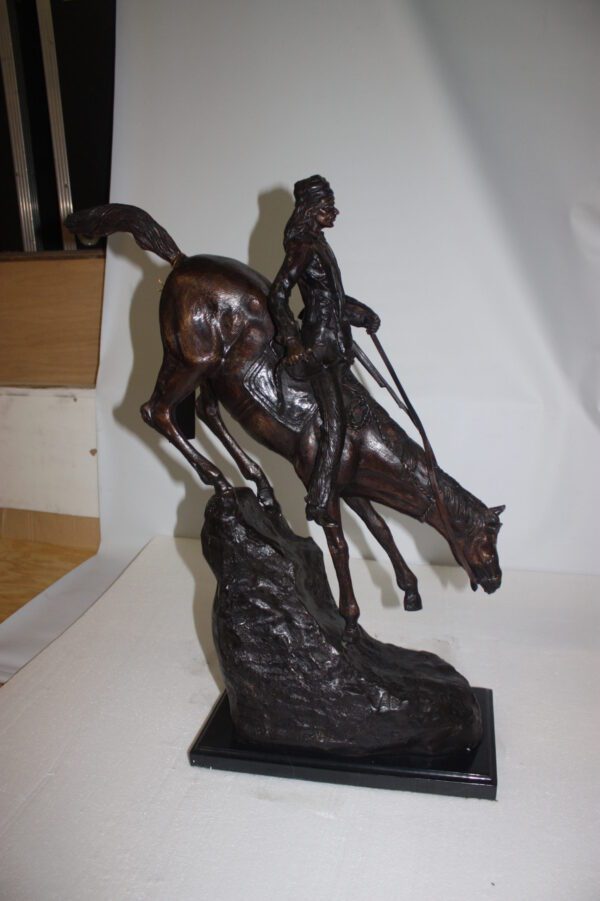 Mountain man Bronze by Fredrick Remington -  Size: 20"L x 8"W x 27"H.