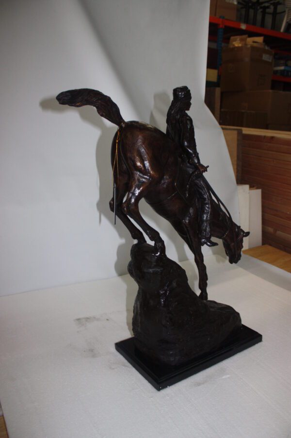 Mountain man Bronze by Fredrick Remington -  Size: 20"L x 8"W x 27"H.