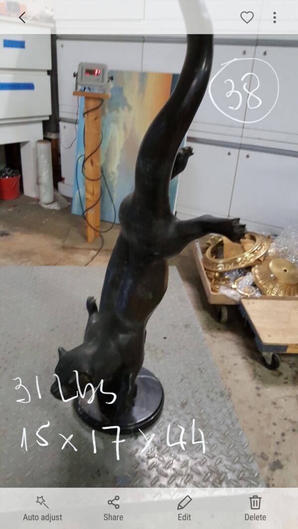 Otter Bronze Statue -  Size: 15"L x 17"W x 44"H.