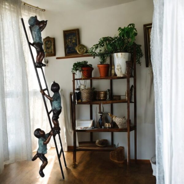 Three kids on a ladder Bronze Statue -  Size: 24"L x 22"W x 94"H. - Image 3