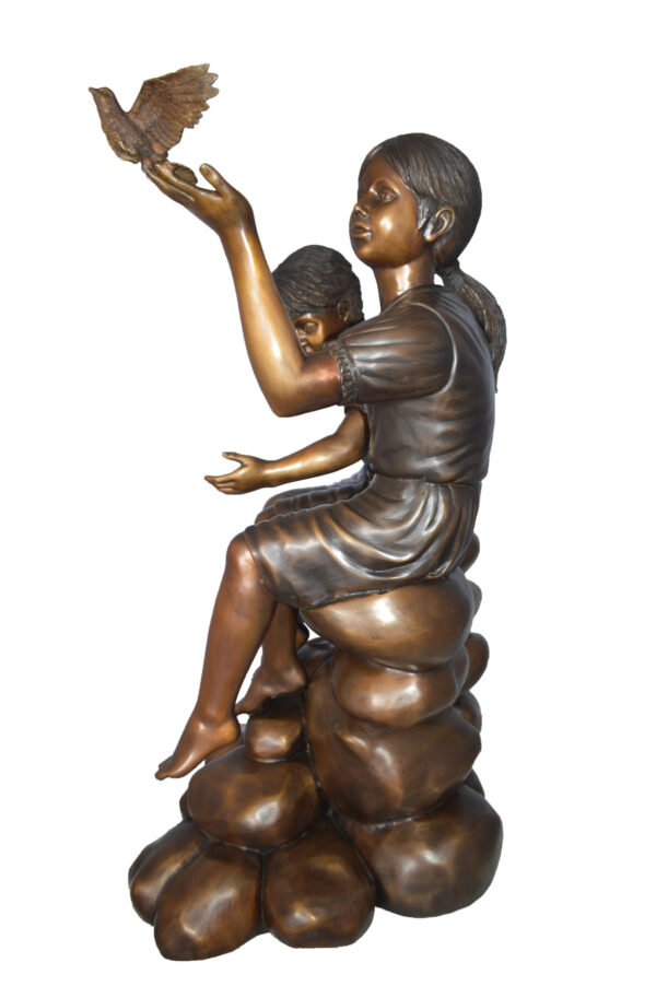 Two Kids on Rocks with a Bird Bronze Statue -  Size: 36"L x 30"W x 44"H. - Image 12