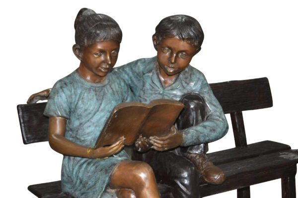 Boy and a Girl on Bench reading book bronze Statue -  Size: 43"L x 20"W x 36"H. - Image 3
