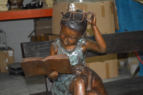 Girl with Glasses on Bench  Bronze Statue -  Size: 43"L x 20"W x 36"H. - Image 4