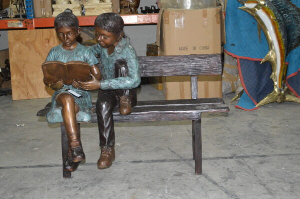 Boy and a Girl on Bench reading book bronze Statue -  Size: 43"L x 20"W x 36"H. - Image 4