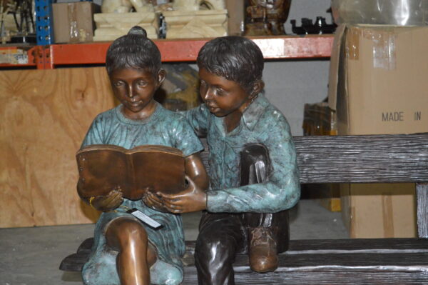 Boy and a Girl on Bench reading book bronze Statue -  Size: 43"L x 20"W x 36"H. - Image 5
